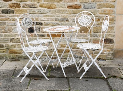 Lot 501 - A White and Gold Painted Cast Iron Folding...