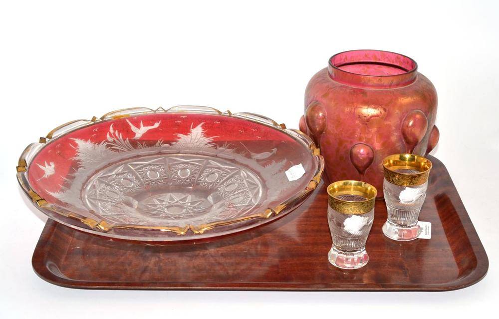 Lot 32 - Two Moser tots, Bohemian flashed and cut bowl and an iridescent glass vase (4)