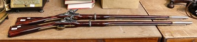 Lot 388 - A pair of 20th century reproduction flintlock...