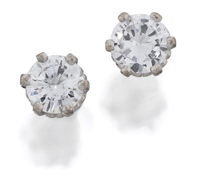 Lot 2027 - A Pair of 18 Carat White Gold Diamond Solitaire Earrings