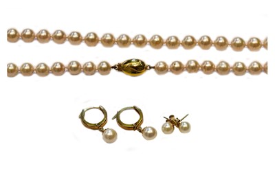 Lot 180 - A cultured pearl necklace, length 63cm; a...