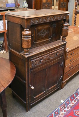 Lot 1327 - A small 1920's carved oak court cupboard, 79cm...