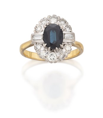 Lot 2054 - A Sapphire and Diamond Cluster Ring