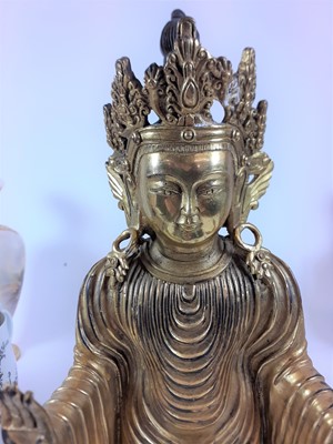 Lot 156 - A Chinese Gilt Bronze Figure of Buddha, in...