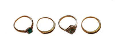 Lot 190 - A 9 carat gold emerald half hoop ring, finger...