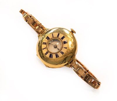 Lot 257 - A half hunter 18 carat gold wristwatch,...