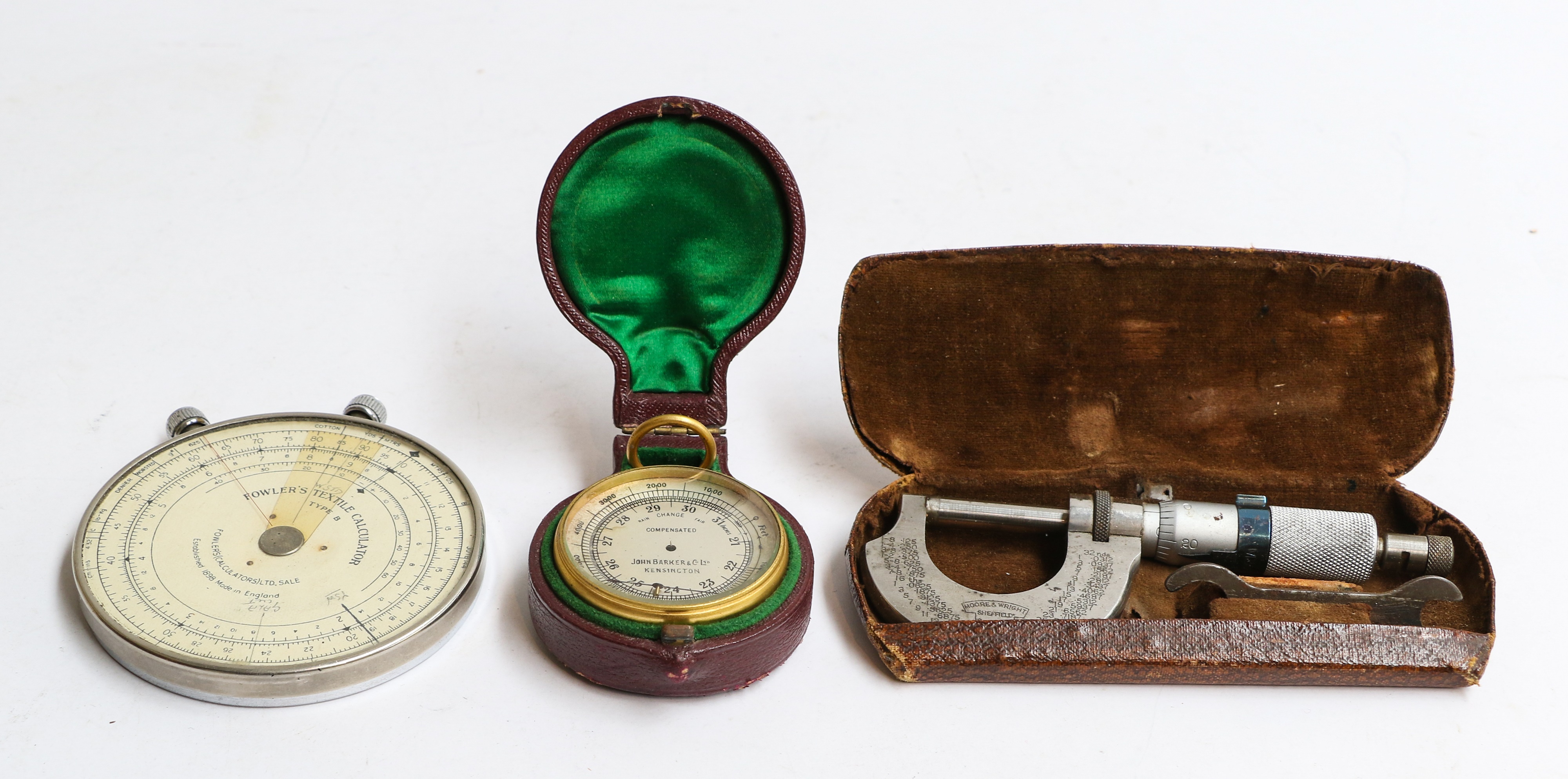 Lot 284 A pocket barometer, textile calculator,