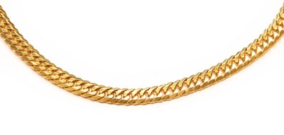 Lot 242 - A curb link necklace, stamped '750', length 49....
