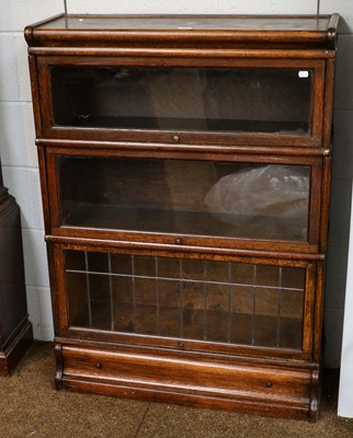 Lot 1400 - A Globe Wernicke style three-height bookcase,...