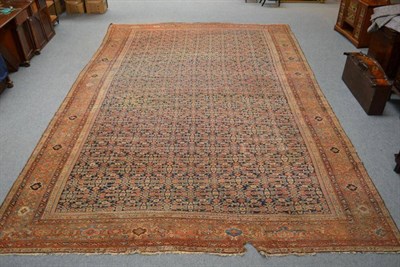 Lot 1103 - Large Feraghan Carpet West Persia The deep indigo Herati field enclosed by rust borders of...