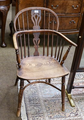 Lot 1371 - A 19th century yew and elm Windsor chair with...