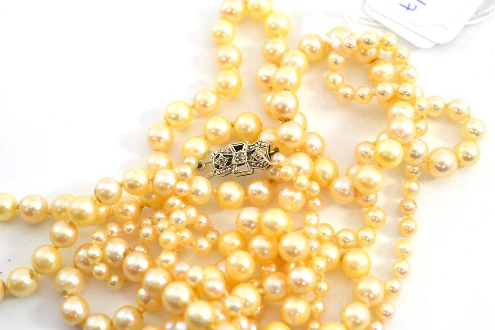 Lot 74 - A cultured pearl necklace, a graduated cultured pearl necklace and loose cultured pearls