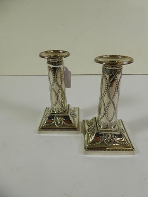 Lot 2120 - A Pair of Edward VII Silver Candlesticks