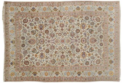 Lot 1105 - Good Kashan Carpet  Central Persia The ivory field with an allover design of scrolling...