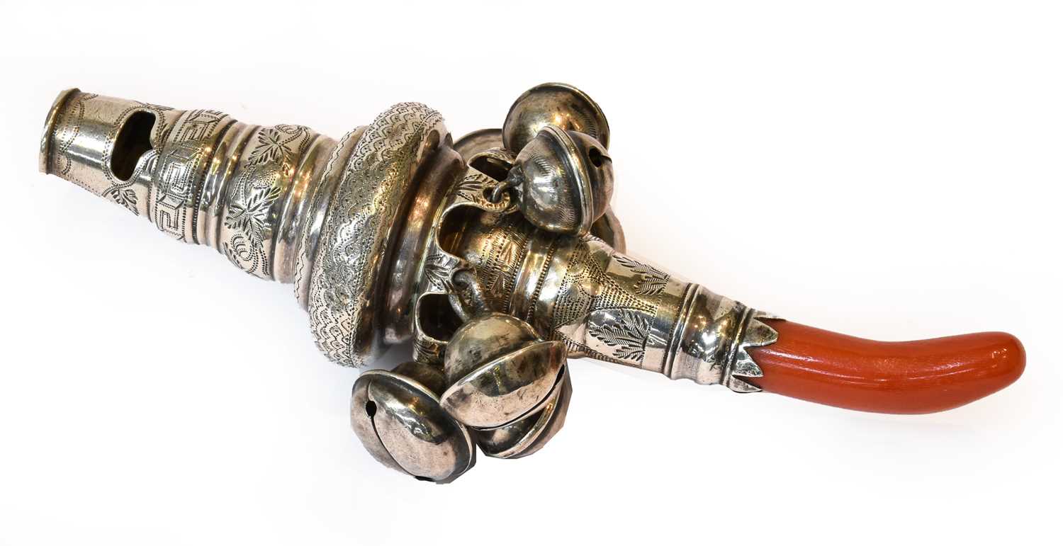Lot 128 - A Silver and Coral Childs Rattle, by Taylor