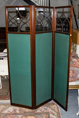 Lot 1380 - A three fold screen with glazed panel