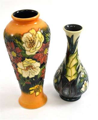 Lot 95 - A modern Moorcroft 'Lamia' pattern vase, 17cm and another Moorcroft collectors club vase, 21cm (2)
