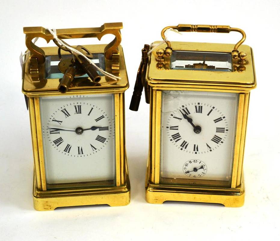 Lot 96 - Brass cased carriage clock and key and another similar