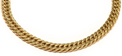 Lot 211 - A curb link necklace, stamped '375', length 46cm