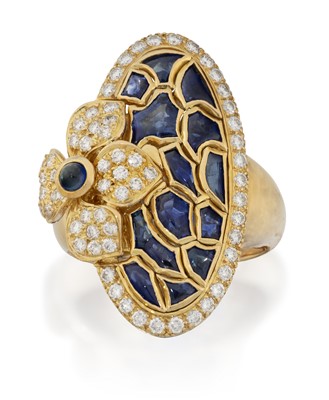 Lot 2333 - An 18 Carat Gold Sapphire and Diamond Ring