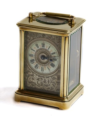 Lot 384 - A brass carriage timepiece, circa 1900