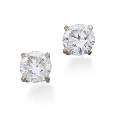Lot 2166 - A Pair of Diamond Solitaire Earrings