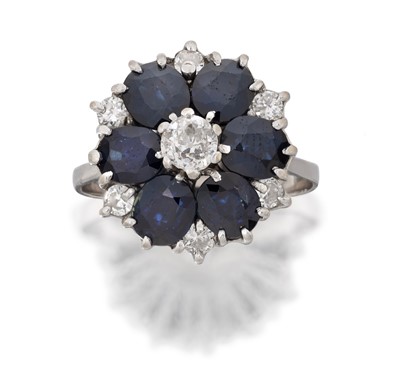 Lot 2031 - A Sapphire and Diamond Cluster Ring