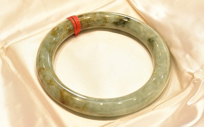 Lot 159 - A jade type bangle, inner diameter 5.5cm