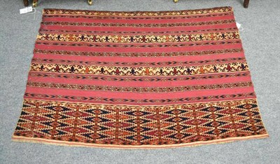 Lot 1108 - Unusual Tekke Chuval  Emirate of Bukhara The plain kilim field with piled bands of geometric...