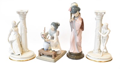 Lot 326 - A Lladro figure of a Geisha holding a fan and...