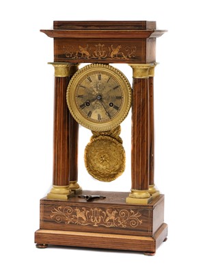 Lot 303 - A Rosewood inlaid striking portico clock,...