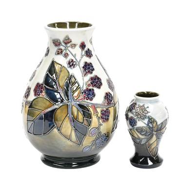Lot 316 - Modern Moorcroft comprising two vases...