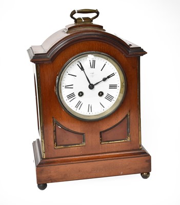 Lot 108 - A mahogany striking mantel clock retailed by Dent