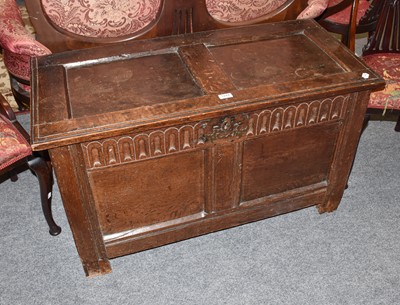 Lot 1244 - An 18th century panelled two panel oak coffer,...