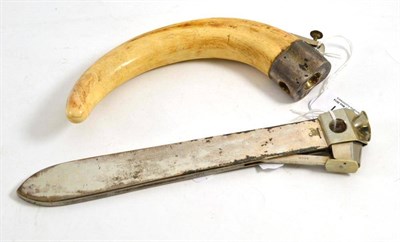 Lot 121 - Large table cigar cutter and another with a warthog tusk