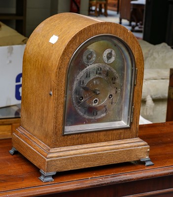 Lot 345 - A German Chiming oak veneered mantel clock,...