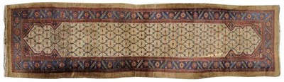 Lot 1110 - Sarab Runner Persian Azerbaijan The ivory lattice field framed by spandrels and mid indigo...