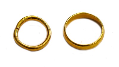 Lot 175 - Two 22 carat gold band rings, finger size T1/2,...