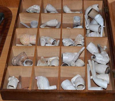 Lot 129 - A collection of clay pipes in two cases