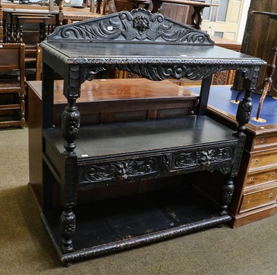 Lot 1168 - A Victorian carved and stained oak three-tier...