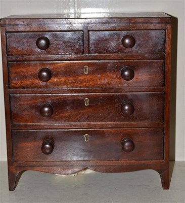 Lot 149 - A 19th century mahogany miniature chest of drawers, small drawer inscribed 'Mary Anne Moulden...