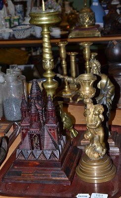 Lot 151 - A carved wood model of a temple on inlaid base, brass pricket candlestick, cherub and shell...