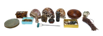 Lot 38 - A collection including Cowrie shells,...