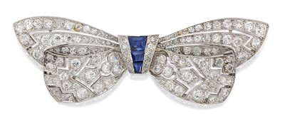 Lot 2343 - A Synthetic Sapphire and Diamond Bow Brooch