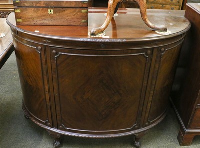 Lot 1344 - A 20th century mahogany demi-lune sideboard,...