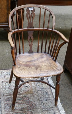 Lot 1369 - A 19th century yew and elm Windsor chair with...