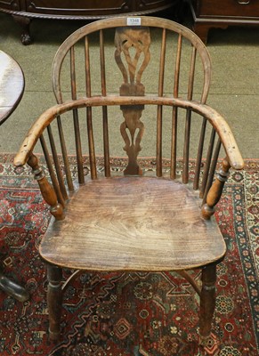 Lot 1348 - A 19th century yew and elm Windsor chair with...