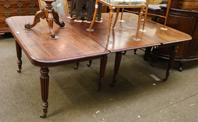 Lot 1339 - A Regency mahogany extending table with one...