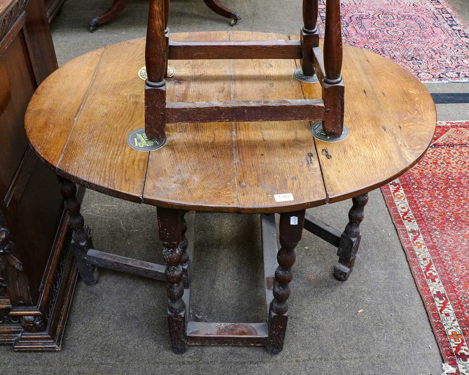 Lot 1113 - A late 18th century oak gateleg table of small...