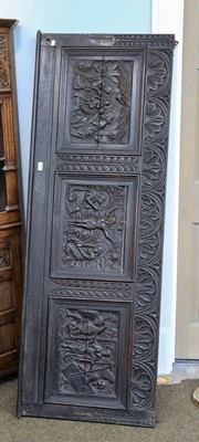 Lot 1389 - A 18th century carved oak panel dated 1717,...